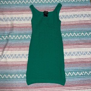 Bebe green sleeveless mini dress with textured material